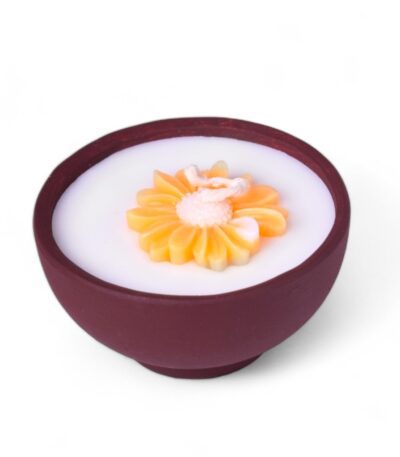 Decorative candles with orange flower design